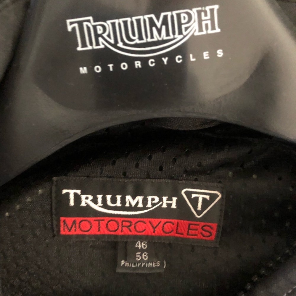 Triumph kevlar motorcycle jacket with armor. EUC